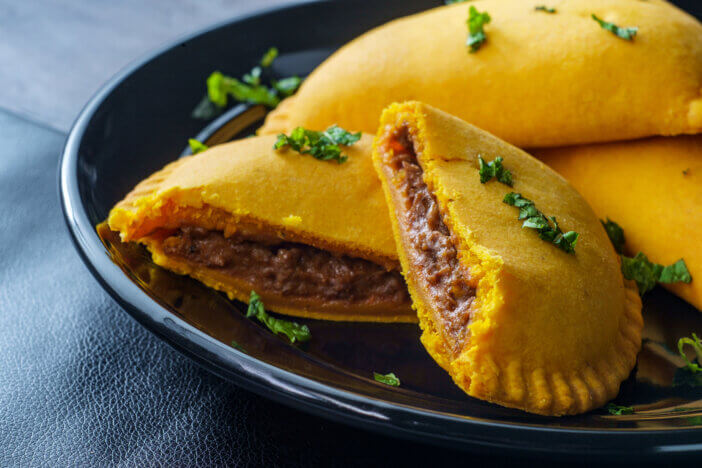 do you eat jamaican patties with a sauce