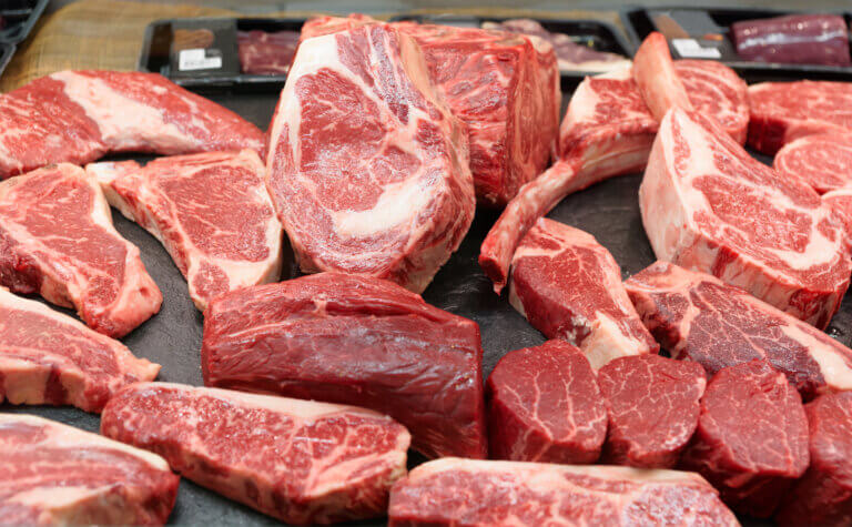 Raw beef on a butcher shop shelf