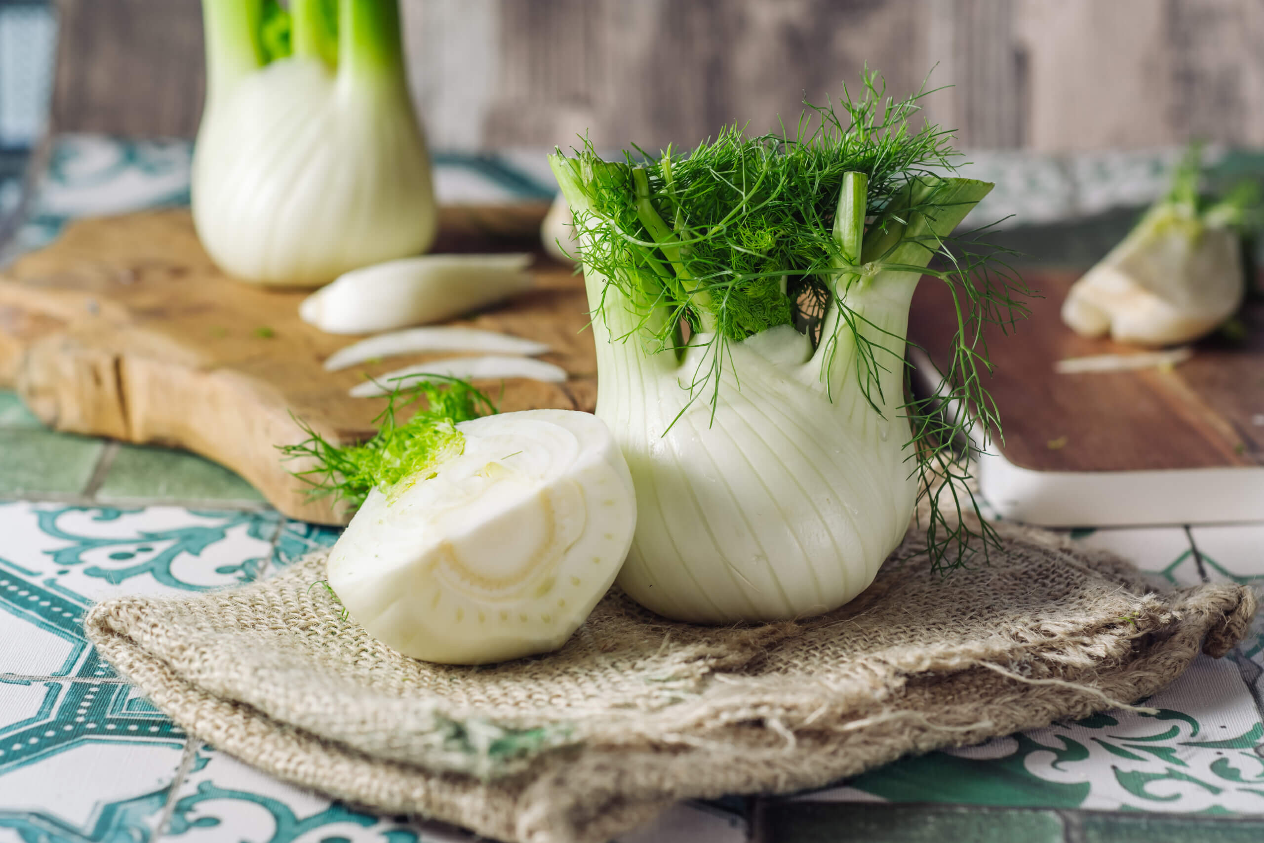 Genuine and fresh raw fennel on a rustic background