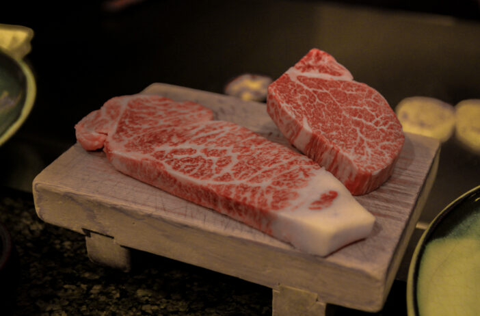 Filet of original Kobe beef on a wooden plate served at a restaurant at Kobe, Japan