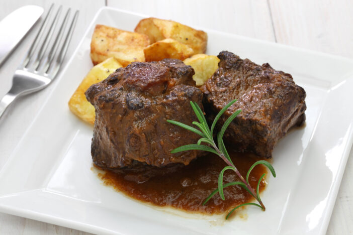 oxtail stew with potato, braised oxtail with potatoes, spanish cuisine