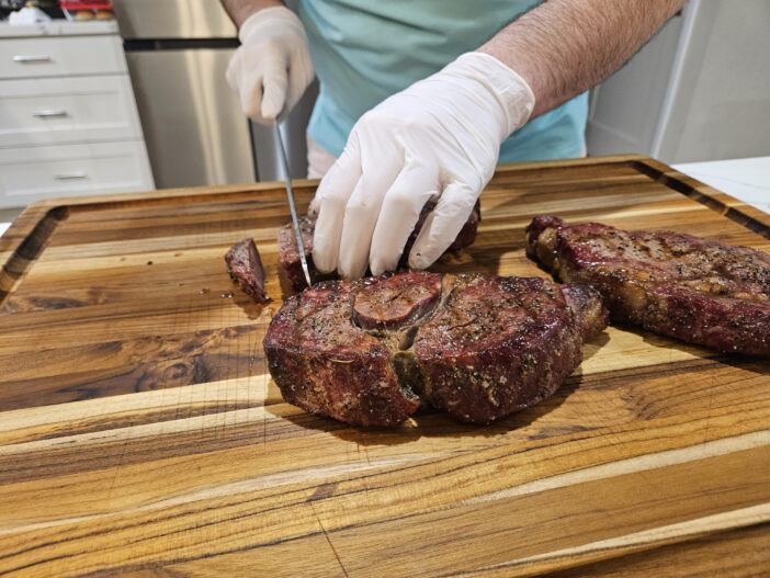 twenty five day aged prime rib eye Steak smoked and seared with salt pepper garlic seasoning