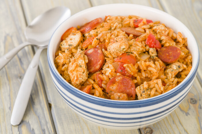 Rice cooked with chicken, smoked sausage and tomatoes.