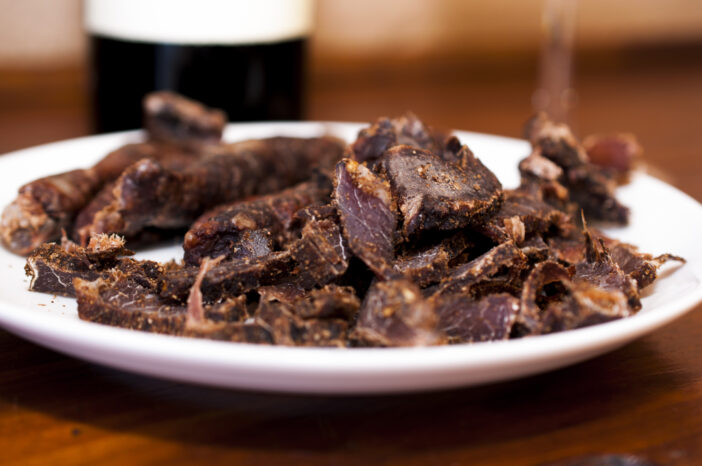 South African snack. Dried red meat known as biltong (jerky). Favorite among South Africans.