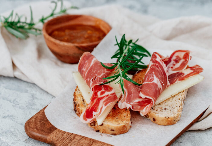 Spanish ham with toasts,rosemay,garlic and olive oil