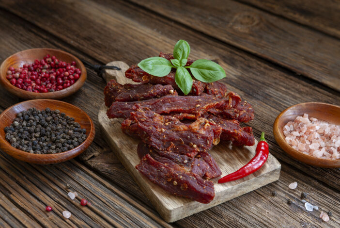 Dry beef meat jerky biltong with hot pepper chilli and spices