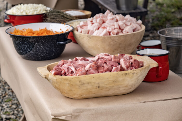 preparation of ingredients for sausages and Christmas Holidays products, One of the most important winter customs in Romanian villages is the pig slaughte