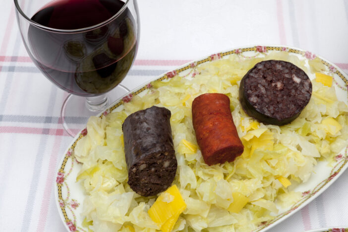 pudding and sausage with vegetables