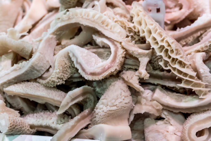 Cattle tripe. Tripe is a type of edible lining from the stomachs of various farm animals