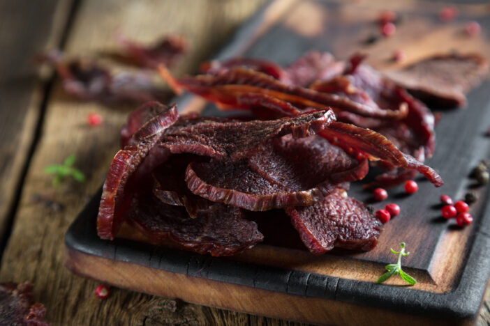 Beef Jerky on a Rustic Wooden Table