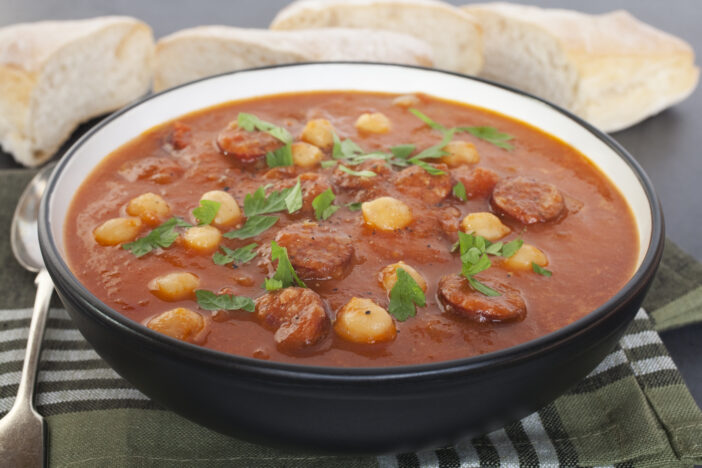 "Spanish tomato soup with chorizo and chickpeas, served with bread, makes a hearty meal. Flavouring includes garlic, cumin and paprika. More soup:-"