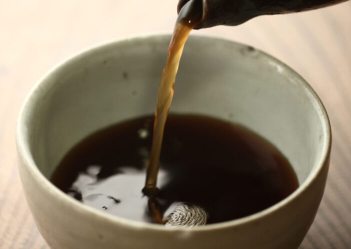 Traditional marinated soy sauce made by fermenting soybeans and salt.