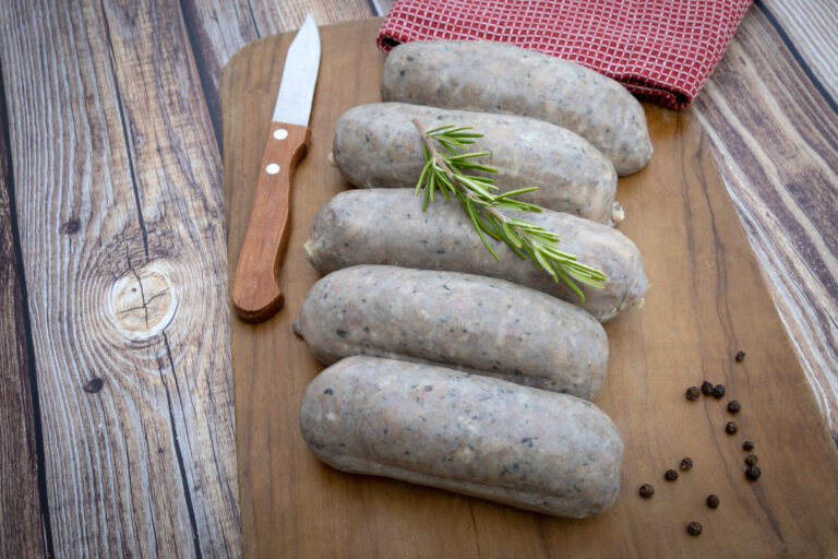 andouilette on a wooden board on a table