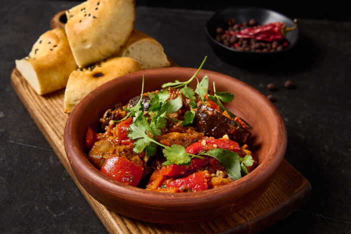 Ajapsandal - Braised Eggplants, Bell Peppers, and Tomatoes with Cilantro and Traditional Spices.