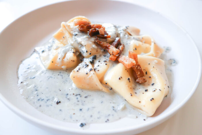 pasta or tortellini with guanciale , pasta carbonara for serve