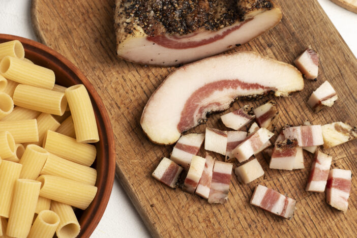 Pieces of traditional Italian cured meat guanciale.