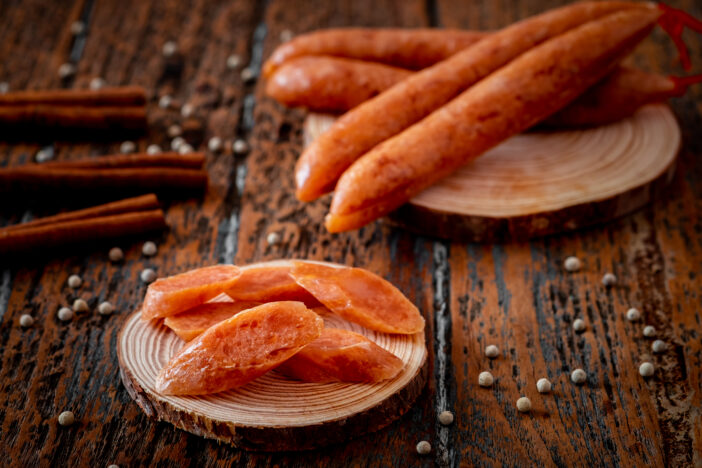 Chinese sausage on wooden board