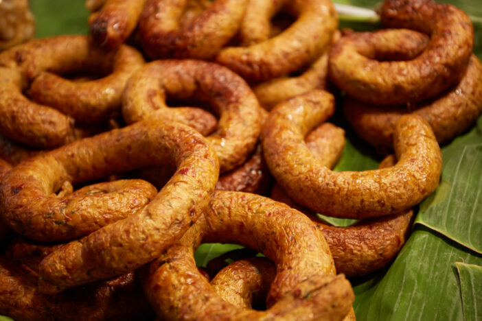 Pork sausages in a street food market, Close-up of Northern Thai pork sausage