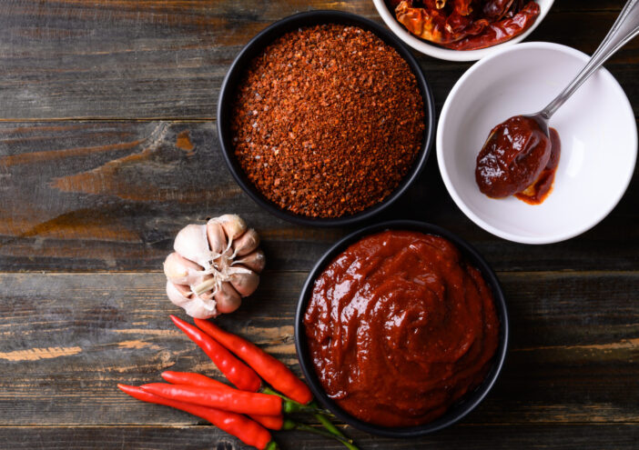 Gochujang (red chili paste), spicy and sweet fermented condiment in Korean food, Table top view