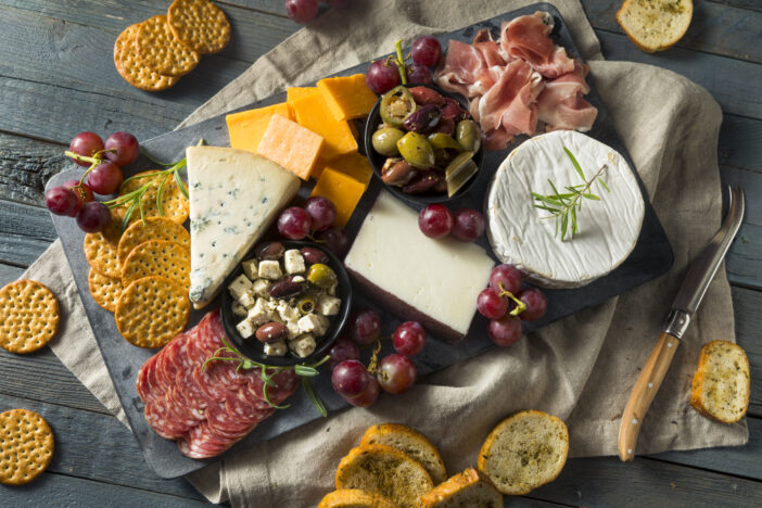 Gourmet Fancy Charcuterie Board with Meat Cheese and Grapes