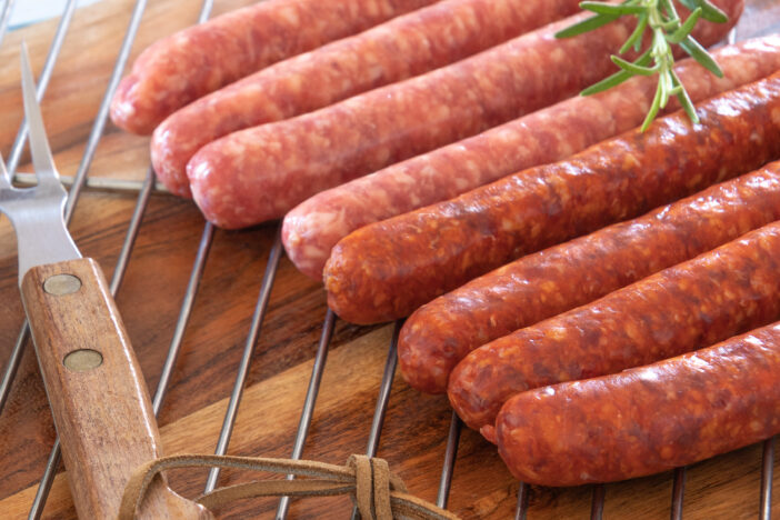 Merguez and raw sausages on a plate