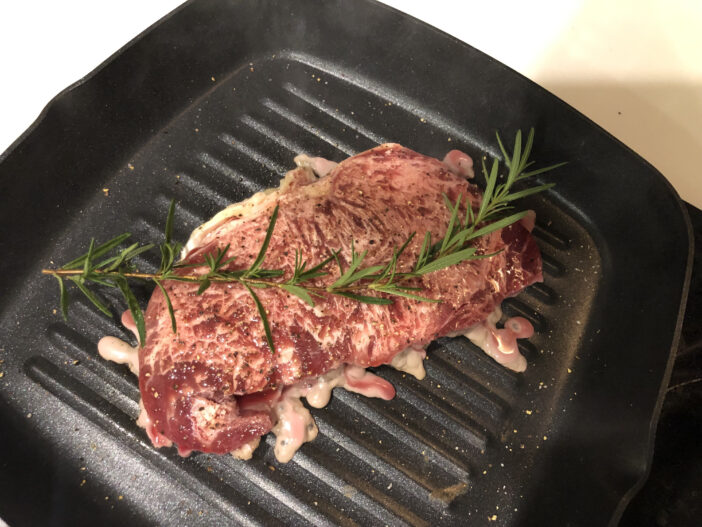 Raw Beef Steak Pan fried Grilled with Rosemary Herb