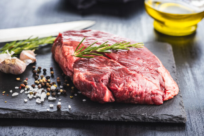 Raw fillet steak beef meat on the cutting board.