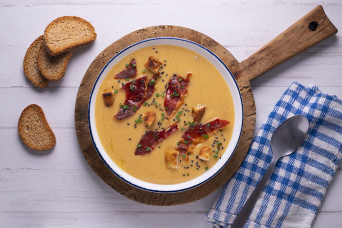 Tomato soup with crispy serrano ham.