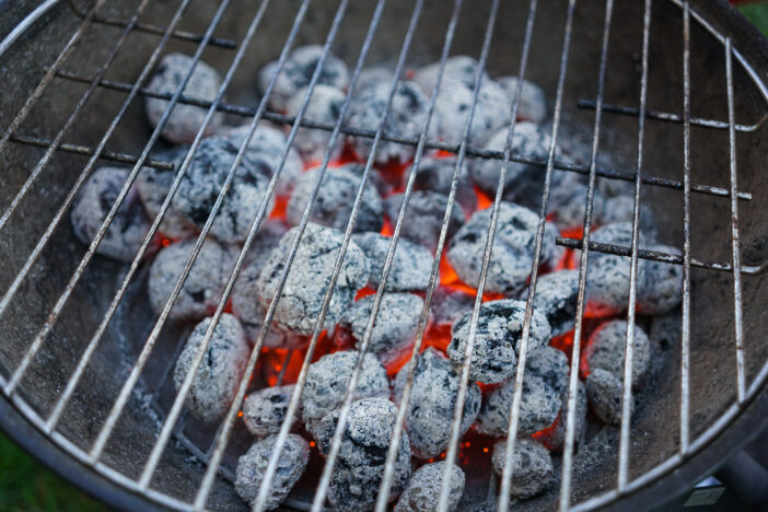 Red hot burning charcoal preparing for grilling on the barbecue grill