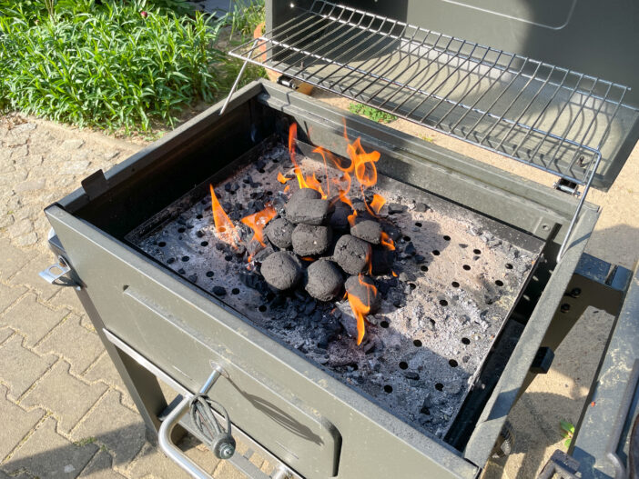 Briquettes on the charcoal grill in the garden