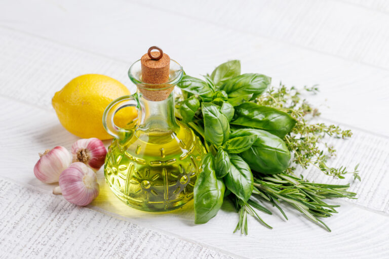 Various herbs and spices on the table, adding vibrant colors and rich aromas to the kitchen