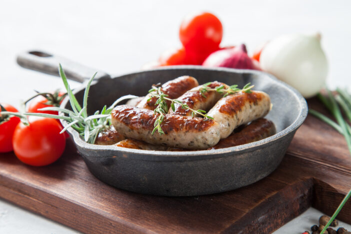 sausages and vegetables on a table, selective focus