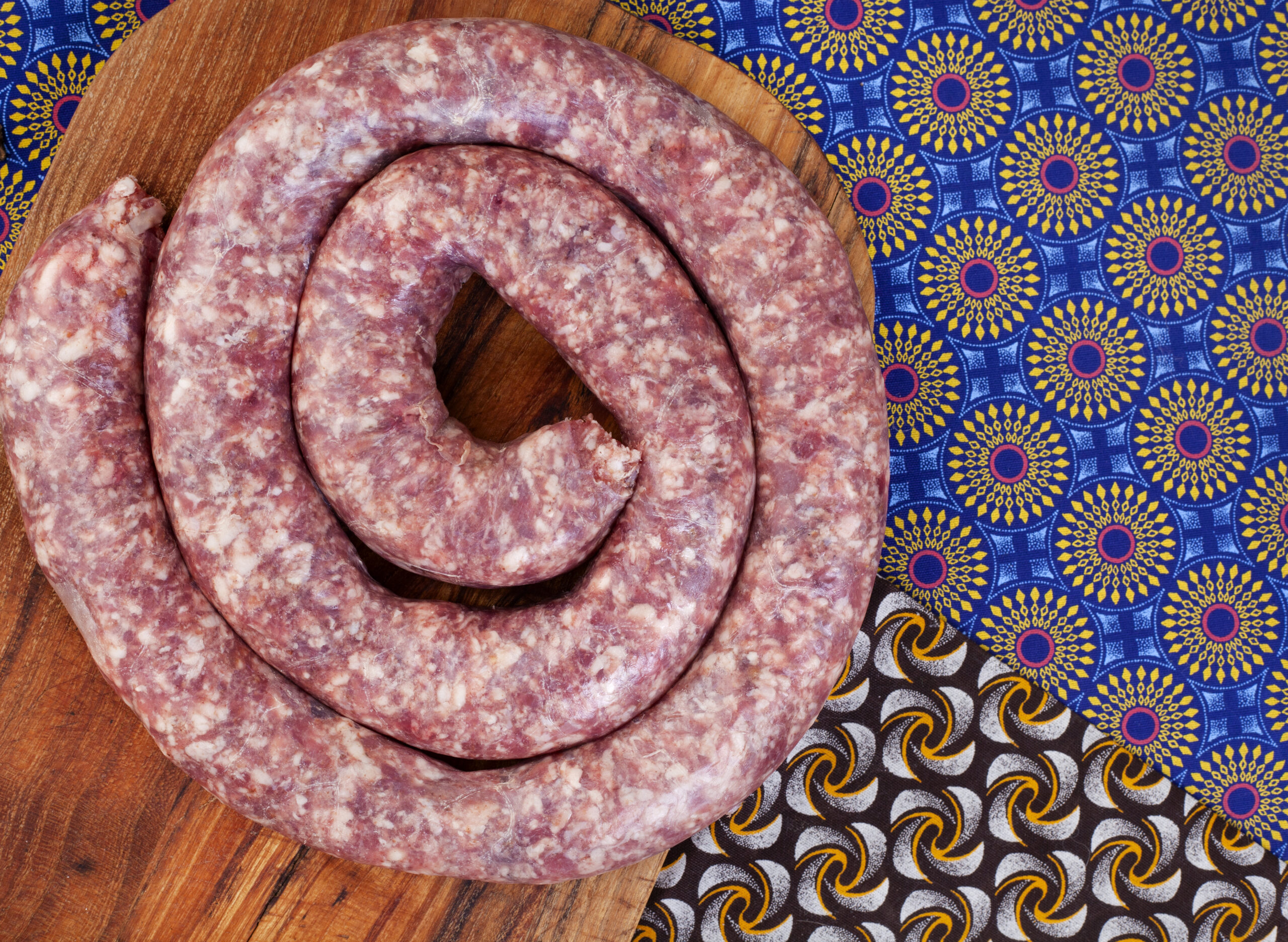 Traditional South African wors or sausage with iconic African printed fabric.