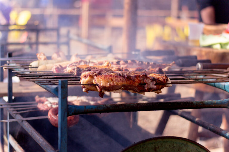 Barbecuing gaucho roasting on fire, churrasco, semana Farroupilha.